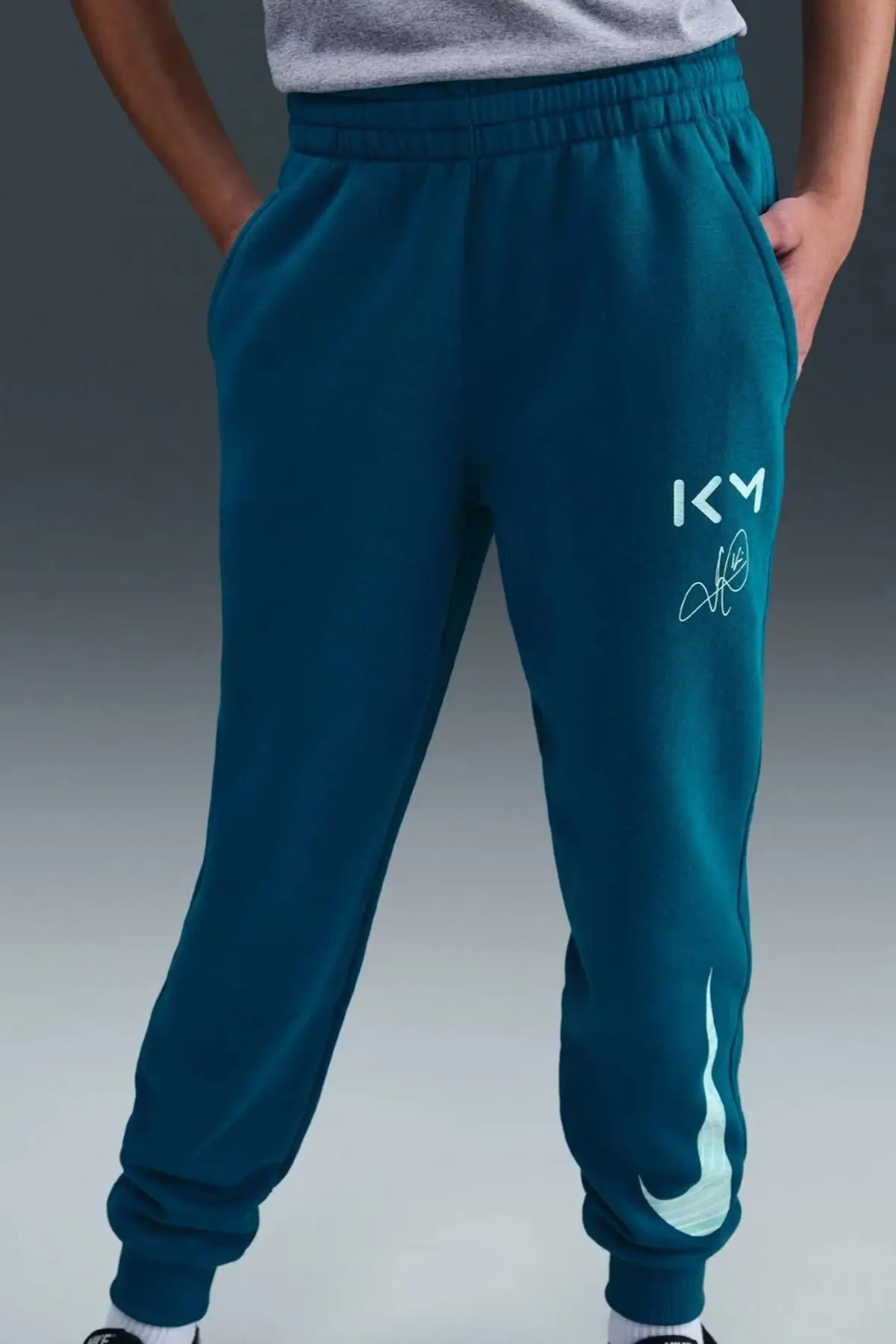 II1506-301 Nike Mbappe Clup fleece Kids Pant.Lastik Paçalı Pamuklu Çocuk Eşofman Altı Yeşil