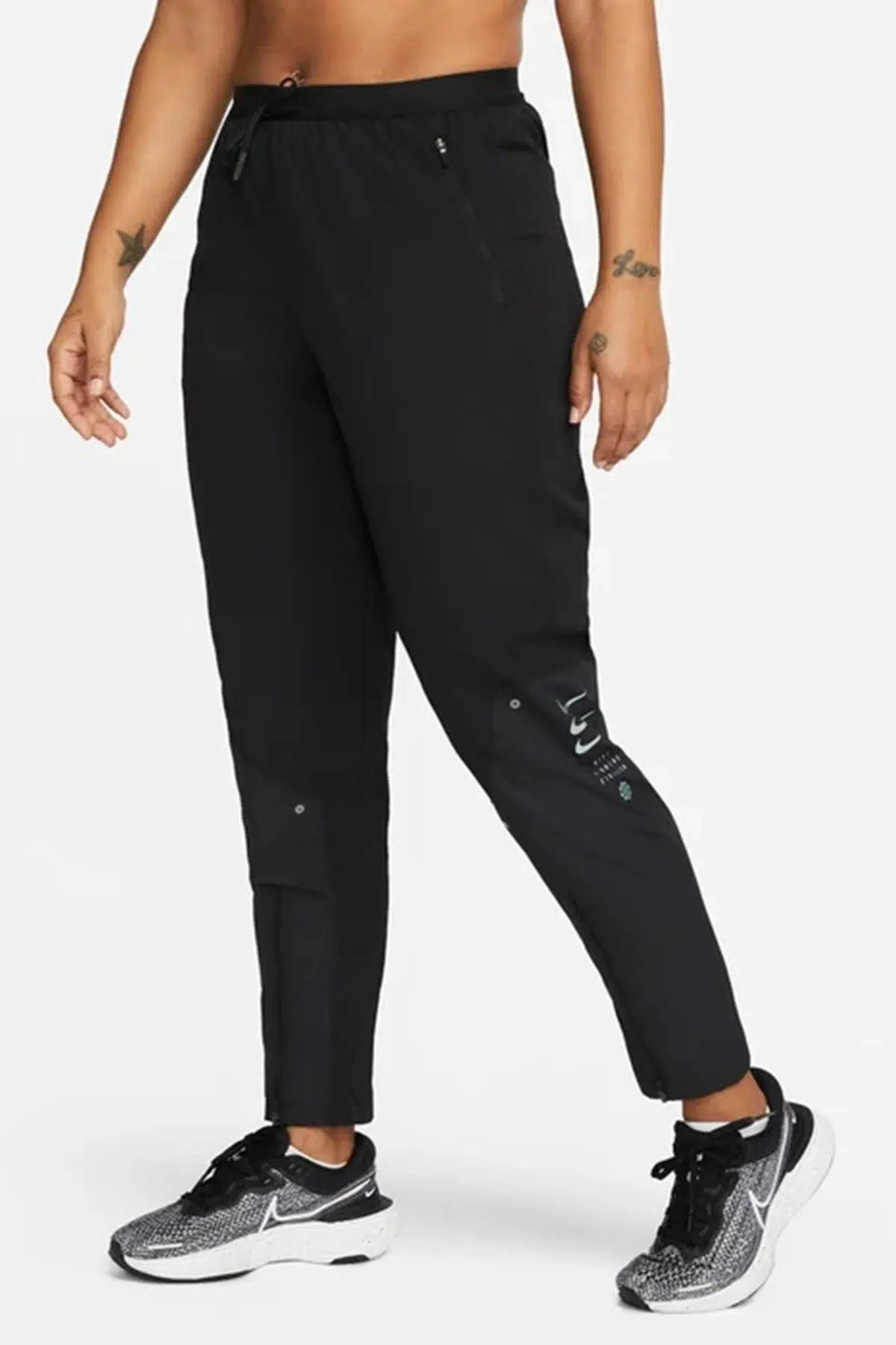 Nike Therma Fit Division Woven Womens Running Pant.Isı Düzenleyici Fermuar Cepli Kadın Koşu Eşofman Altı Siyah